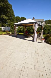 Stamped concrete patio with pergola