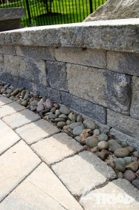 Retaining wall made from decorative concrete blocks